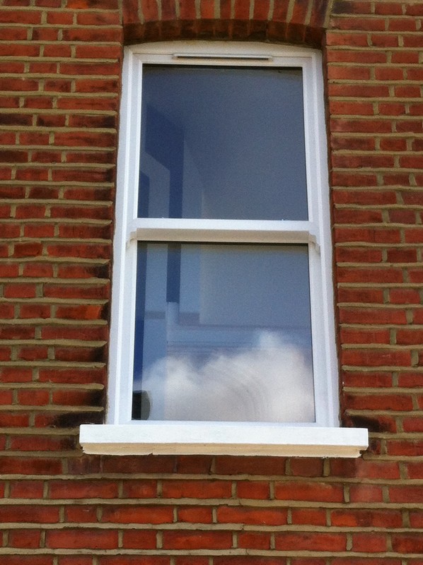 uPVC sash window on Victorian red brick house in Streatham Hill